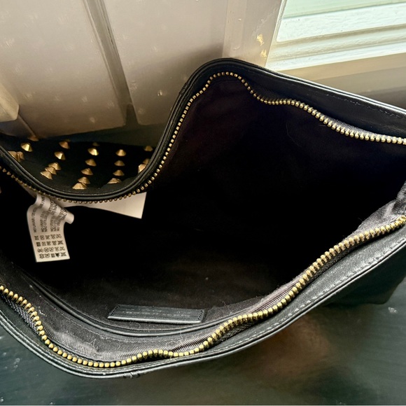 Crossbody or shoulder bag in black leather with gold studs. - Picture 3 of 8